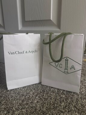 Authentic Van Cleef & Arpels White Bags with Green Logo W/ Authenticity letters